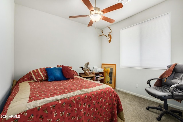 carpeted bedroom featuring visible vents, ceiling fan, and baseboards