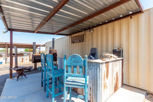 view of patio / terrace with an exterior structure and an outdoor structure