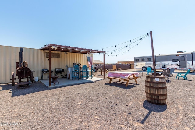 exterior space featuring fence and a patio area