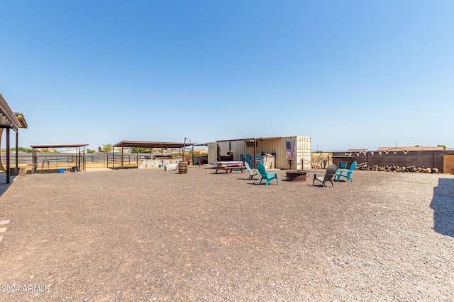 view of play area with a fire pit