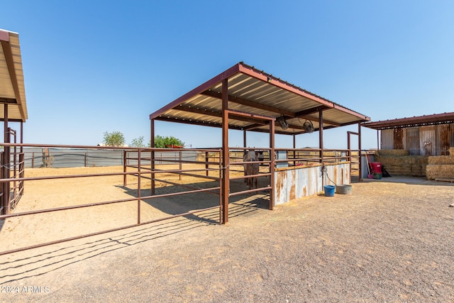 view of stable featuring an outbuilding