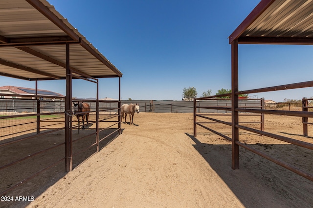 view of yard with a rural view