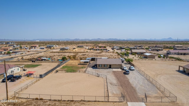 aerial view featuring view of desert and a mountain view