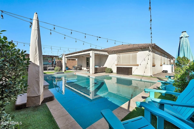 view of pool featuring a patio area and outdoor lounge area