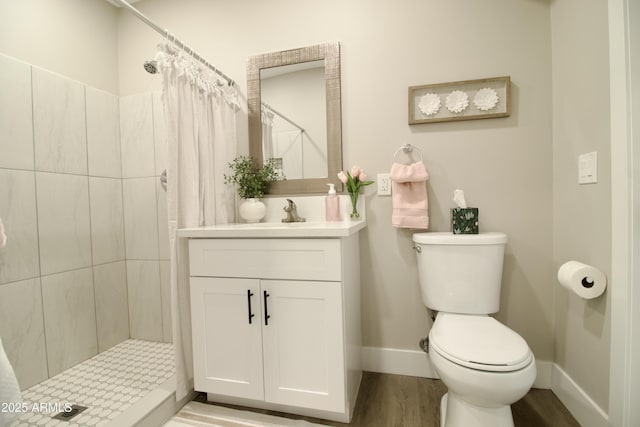 2573 E Superstition Blvd, Apache Junction, AZ 85119 - full bath featuring vanity, baseboards, toilet, and a tile shower