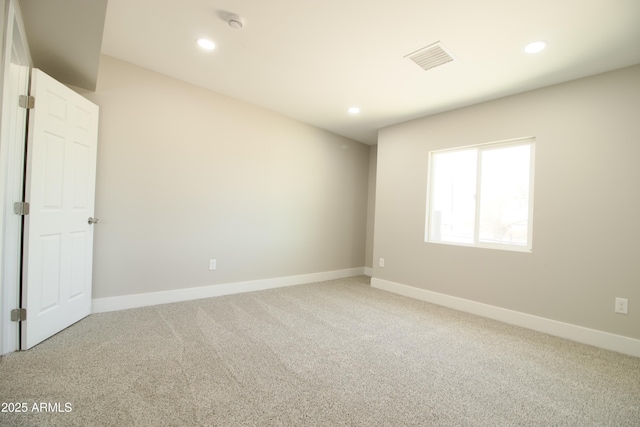 2573 E Superstition Blvd, Apache Junction, AZ 85119 - unfurnished room with baseboards, light colored carpet, and recessed lighting