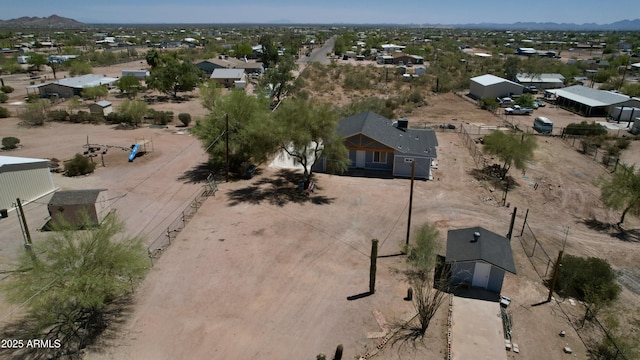 2573 E Superstition Blvd, Apache Junction, AZ 85119 - aerial view of property's location with a mountain backdrop and nearby suburban area