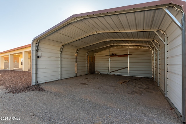 exterior space with a carport