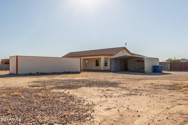 view of front facade featuring a carport