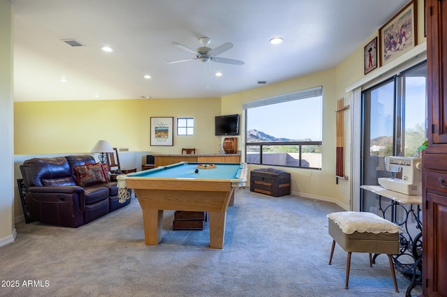 rec room featuring pool table, light colored carpet, and ceiling fan