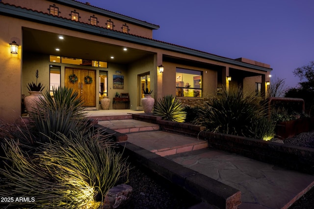 view of front of house featuring a patio area