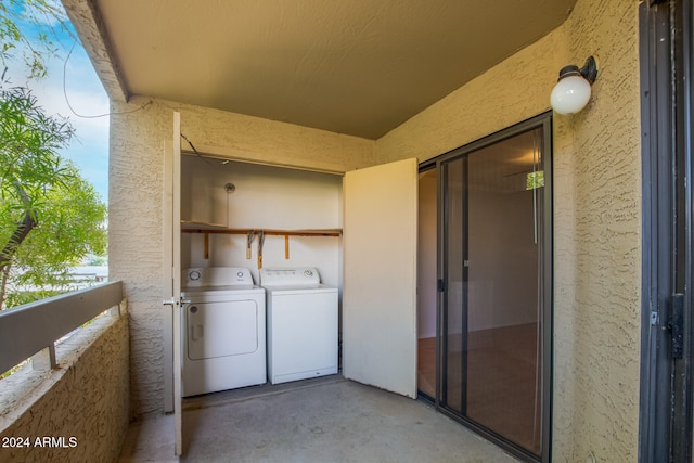 laundry area featuring washer and clothes dryer