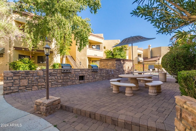 view of patio featuring an outdoor kitchen and grilling area