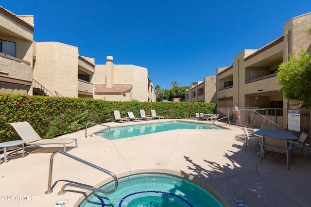 view of pool featuring a patio area