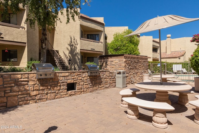 view of patio / terrace featuring area for grilling and exterior kitchen