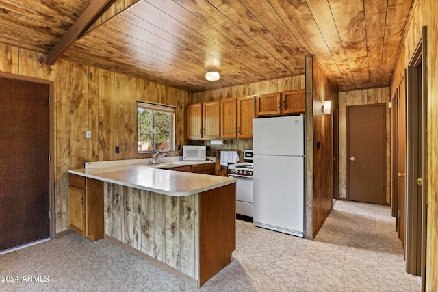 kitchen featuring white appliances, light tile patterned floors, wood walls, kitchen peninsula, and wood ceiling