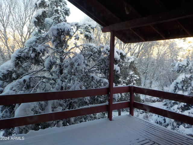 view of snow covered deck