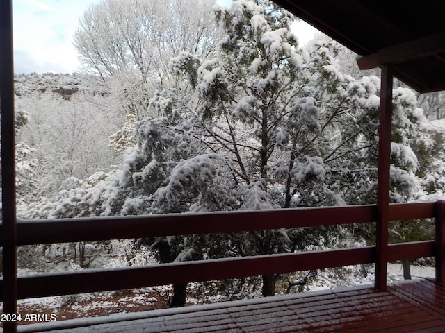 view of snow covered deck