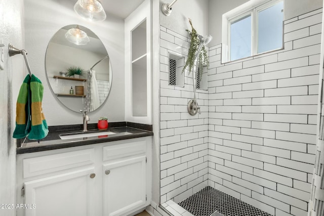 bathroom featuring vanity and a shower with curtain