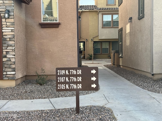 exterior space featuring stucco siding