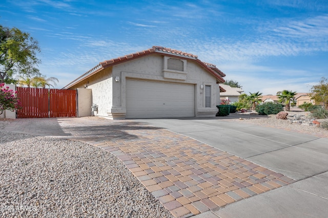 view of front of property featuring a garage