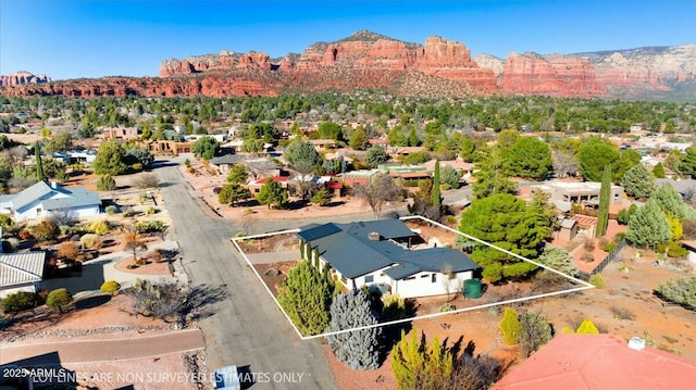 birds eye view of property featuring a residential view and a mountain view