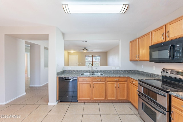 645 W Kingman Loop, Casa Grande, AZ 85122 - kitchen featuring black appliances, a sink, light tile patterned flooring, a ceiling fan, and dark countertops