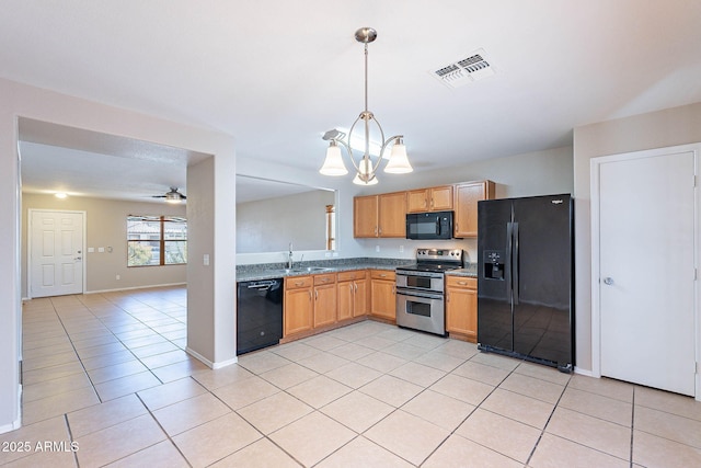 645 W Kingman Loop, Casa Grande, AZ 85122 - kitchen featuring black appliances, a chandelier, light tile patterned flooring, decorative light fixtures, and a sink