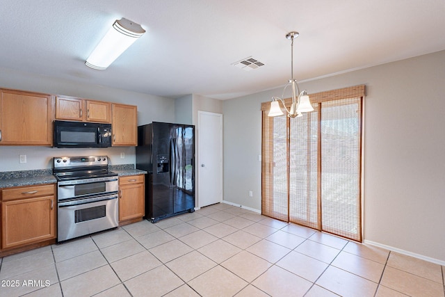 645 W Kingman Loop, Casa Grande, AZ 85122 - kitchen featuring black appliances, baseboards, a chandelier, dark countertops, and pendant lighting