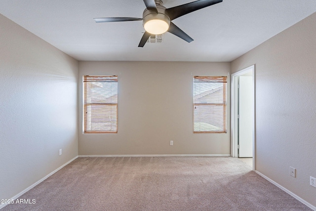 645 W Kingman Loop, Casa Grande, AZ 85122 - empty room featuring carpet, plenty of natural light, and ceiling fan