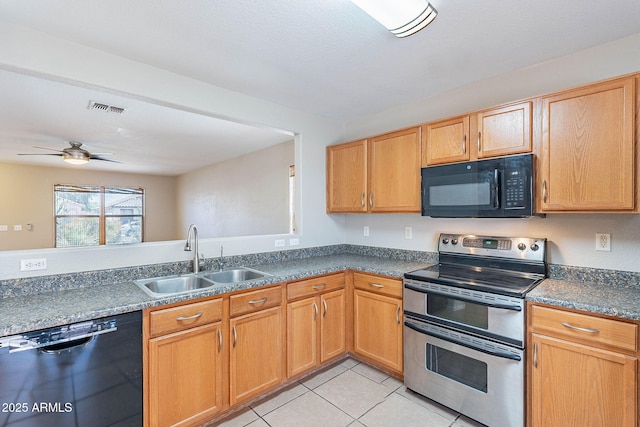 645 W Kingman Loop, Casa Grande, AZ 85122 - kitchen with black appliances, a sink, dark countertops, a ceiling fan, and light tile patterned floors