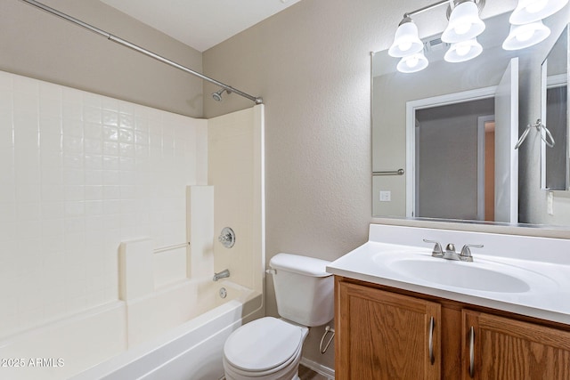 645 W Kingman Loop, Casa Grande, AZ 85122 - bathroom with a textured wall, vanity, toilet, and shower / washtub combination