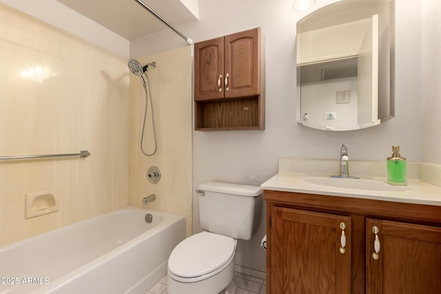 bathroom with toilet, vanity, tile patterned flooring, and shower / washtub combination
