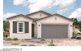 view of front of home with a garage and driveway