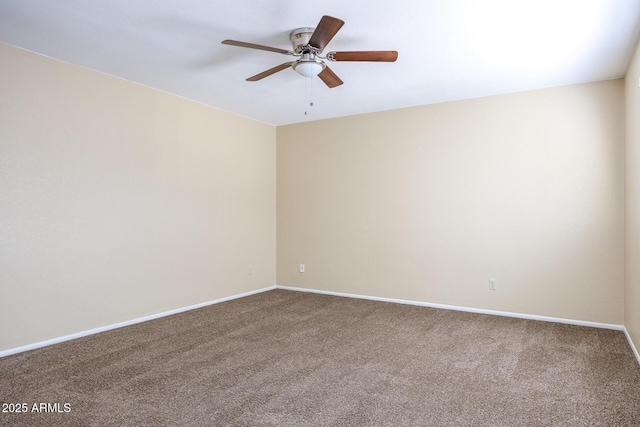 empty room with carpet and ceiling fan