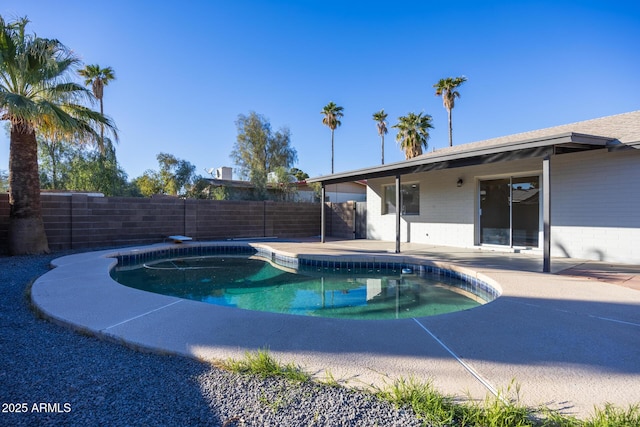 view of pool featuring a patio