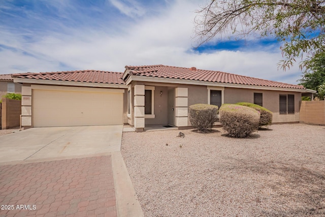 6085 S Wilson Dr, Chandler, AZ 85249 - mediterranean / spanish home with a garage, stucco siding, concrete driveway, and a tile roof