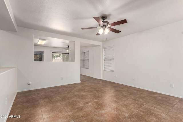 6085 S Wilson Dr, Chandler, AZ 85249 - empty room featuring a ceiling fan and baseboards