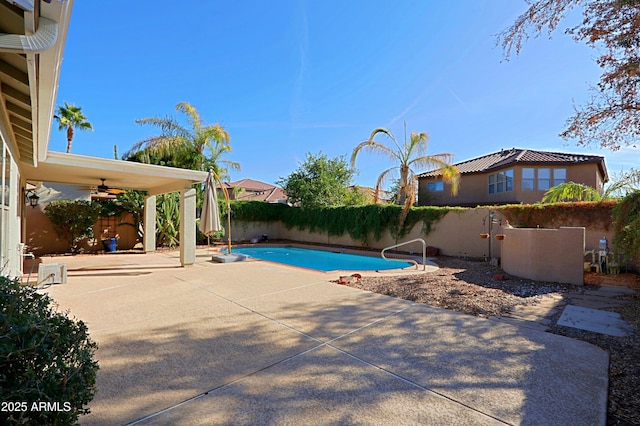 view of pool featuring a patio area and ceiling fan