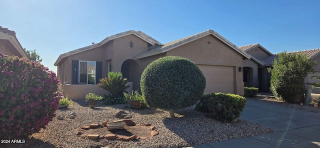 view of front of home with a garage