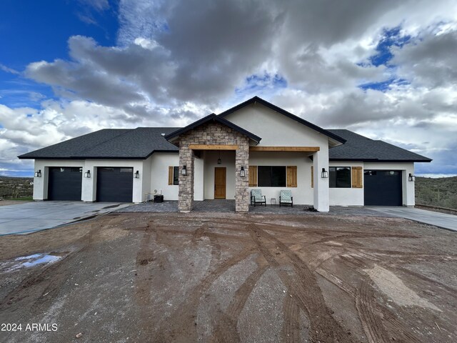 view of front of property featuring a garage