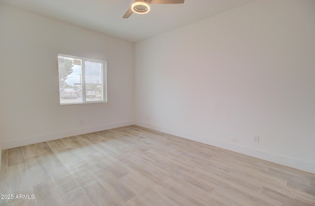 1519 N Etta St, Casa Grande, AZ 85122 - unfurnished room featuring a ceiling fan, light wood-style floors, and baseboards
