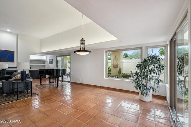 interior space featuring baseboards and recessed lighting
