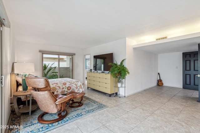 bedroom with visible vents and light tile patterned flooring