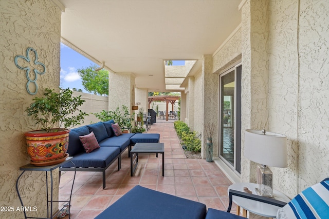 view of patio with an outdoor living space and fence