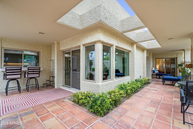 view of patio featuring visible vents
