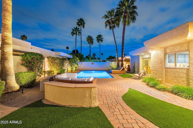 view of swimming pool with a patio, a fenced backyard, and a fenced in pool
