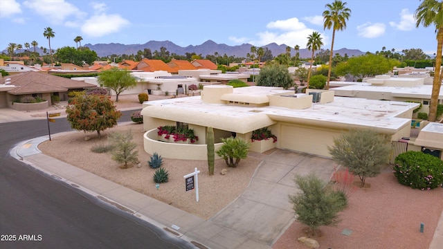 exterior space featuring a mountain view and a residential view