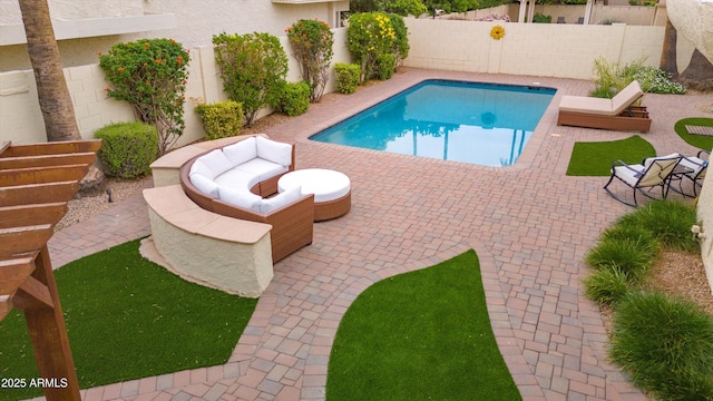 view of pool featuring a fenced in pool, a patio, and a fenced backyard