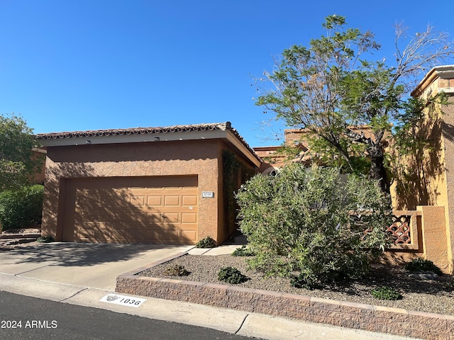 exterior space with a garage